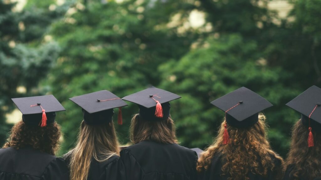 group of graduated students back view